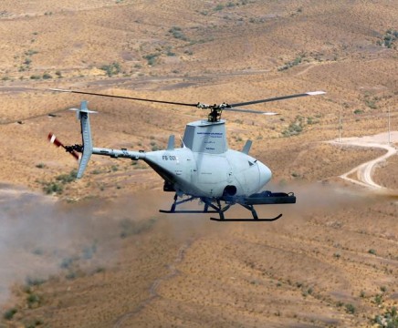 Northrop Grumman's RQ-8A Fire Scout Vertical Takeoff and Landing Tactical Unmanned Aerial Vehicle (VTUAV) test fires the second of two Mark (MK) 66 2.75-inch unguided rockets during weapons testing at Arizona's Yuma Proving Grounds. The Fire Scout has the ability to autonomously take off and land from any aviation-capable warship and at unprepared landing zones, with an on-station endurance of over four hours. The Fire Scout system is capable of continuous operations, providing coverage at 110 nautical miles from the launch site. Utilizing a baseline payload that includes electro-optical/infrared sensors and a laser rangefinder/designator the Fire Scout can find and identify tactical targets, track and designate targets, accurately provide targeting data to strike platforms, employ precision weapons, and perform battle damage assessment.