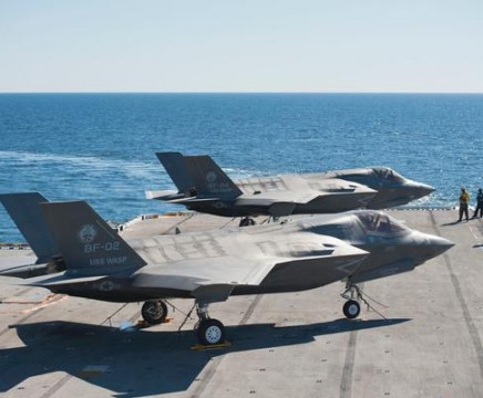 Two F-35Bs operate at sea on USS Wasp (LHD 1) Oct. 16 as part of inital sea trials. Wasp headed back toward homeport Oct. 21 after spending three weeks at sea hosting the F-35B Lightning II, Joint Strike Fighter (JSF). (Photo courtesy of Lockheed Martin)