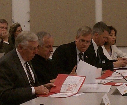 From the left, Congressman Steny Hoyer, Vice Adm. David Architzel and Del. John Bohanan review materials before Friday's meeting with the Maryland Federal Facilities Advisory Board.