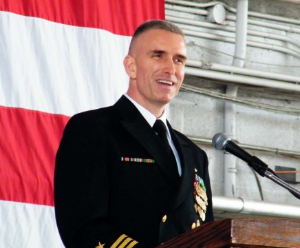 Cmdr. Thomas Tennant addresses VX-23 for the first time as its new commander.