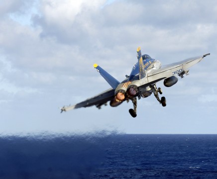 F/A-18C Hornet launches from the flight deck aboard USS Kitty Hawk over the China Sea
