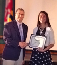 Phil Farrell of Sabre presents Amanda Carroll STEM scholarship certificate