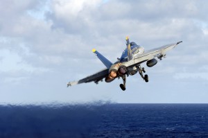  F/A-18C Hornet launches from the flight deck aboard USS Kitty Hawk over the China Sea