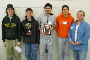 Huntingtown High School took first place in the Southern Maryland High School Computer Bowl. Pictured from left are Joey Watts, Vince Kubala, coach Tom Currier, Jason Merewitz, and Gunnar Arnesen.