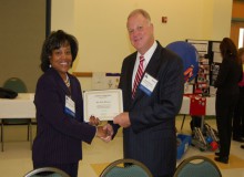 Scott Stewart receives STEM award from Sharmella Riggs NAVAIR